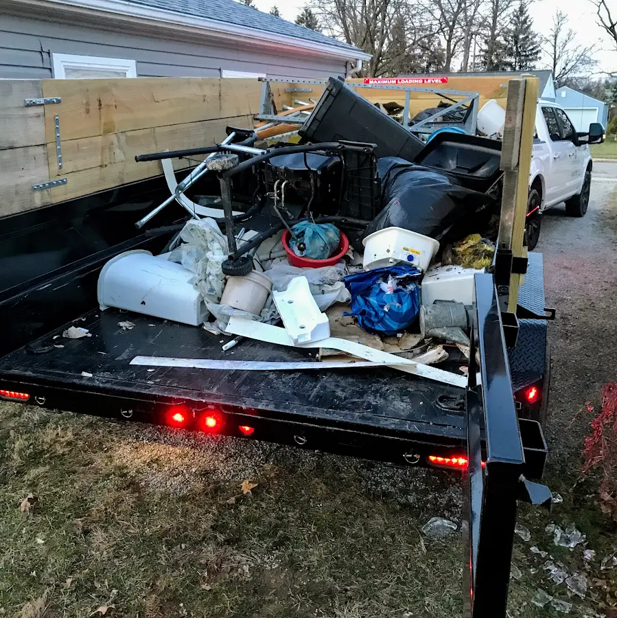 Roll-off dumpster delivered to a residential driveway in New Bremen
